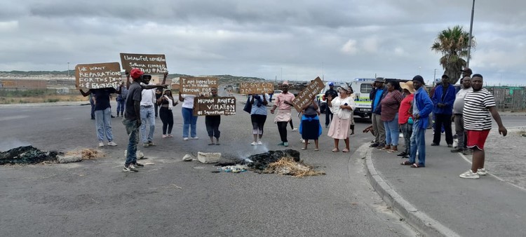 City of Cape Town must rebuild homes, demand protesters